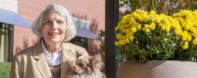 cats-dogs-and-other-critters-are-welcome-at-retirement-communities senior woman with dog