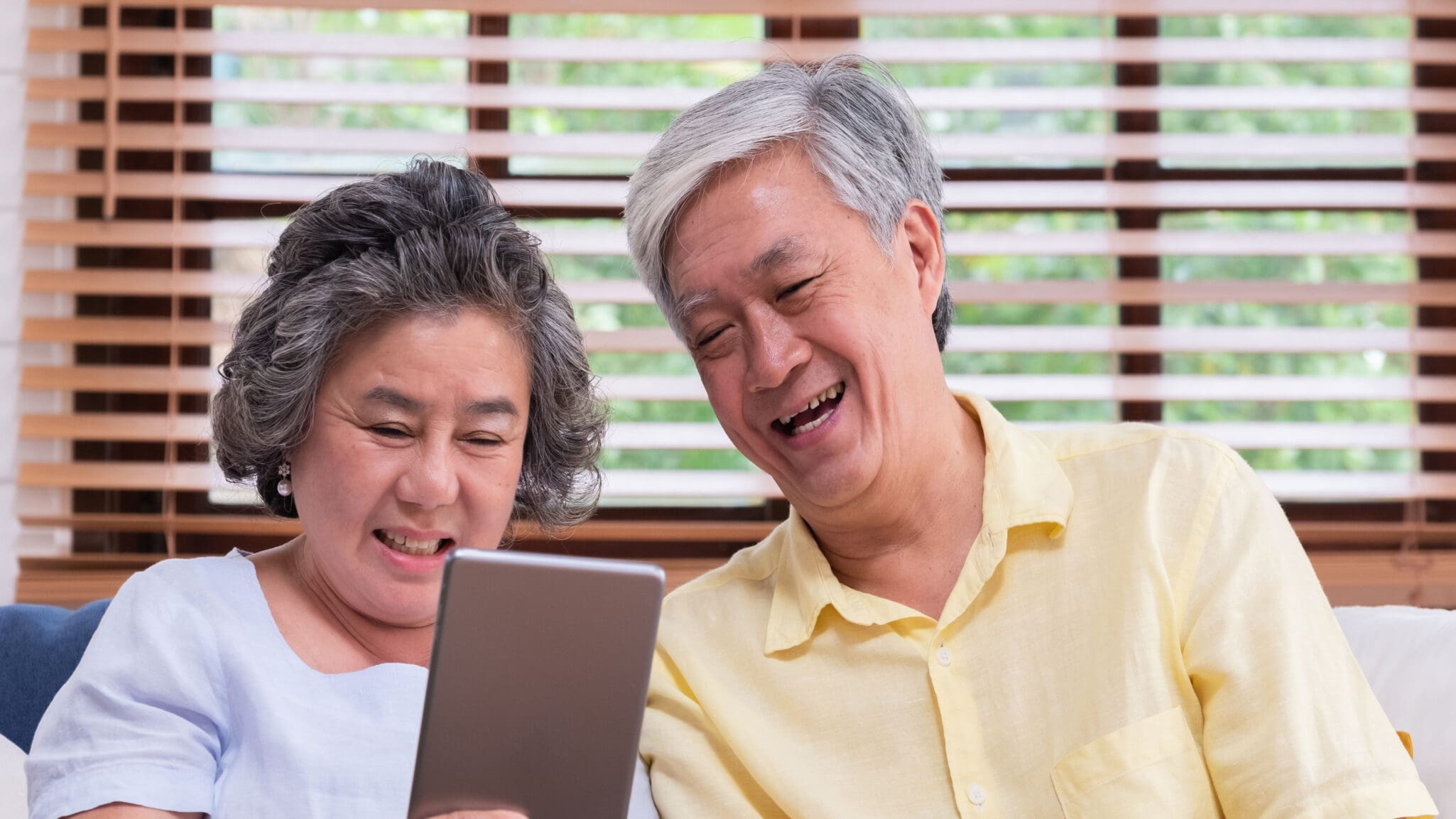lfp-campaign-blog-may-week-4-blogimage a senior couple researching senior living options on their tablet