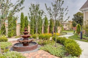 an outdoor courtyard with a fountain