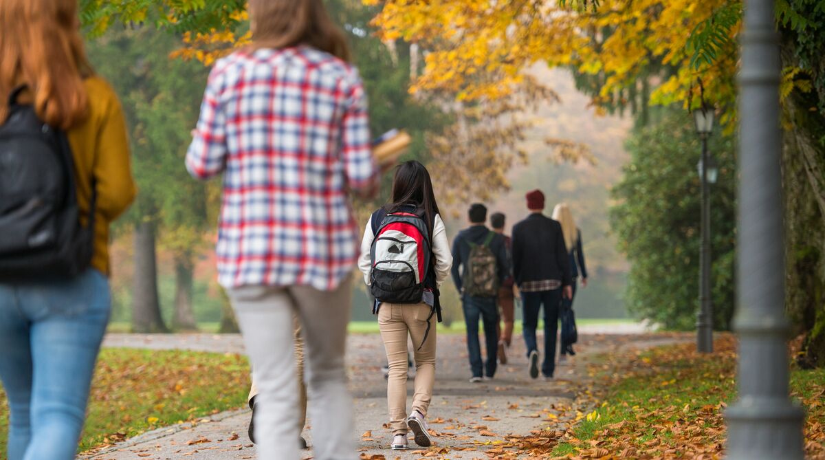 Small-GettyImages-680835216 College students walking on campus