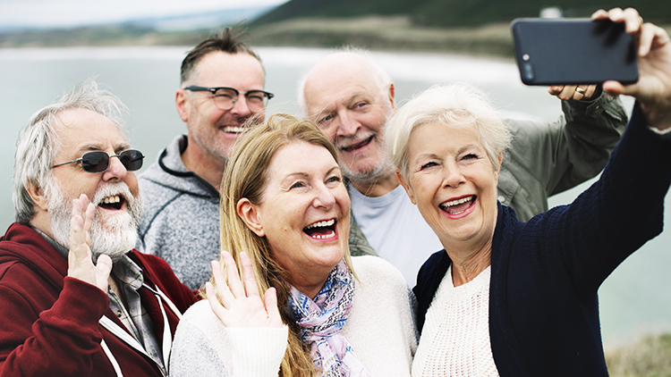 Group of happy seniors taking a selfie smiling group of seniors taking a picture
