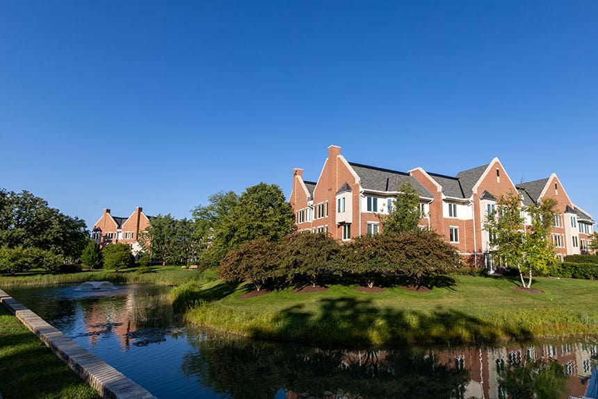 Beautiful picture of Lake Forest Place with a reflecting pool in the foreground