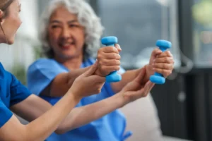 Senior woman working with a personal trainer.