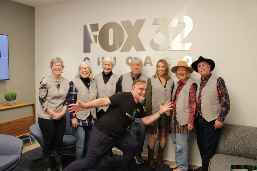 RhythmWranglers pose in front of Fox32 RhythmWranglers pose in front of Fox32