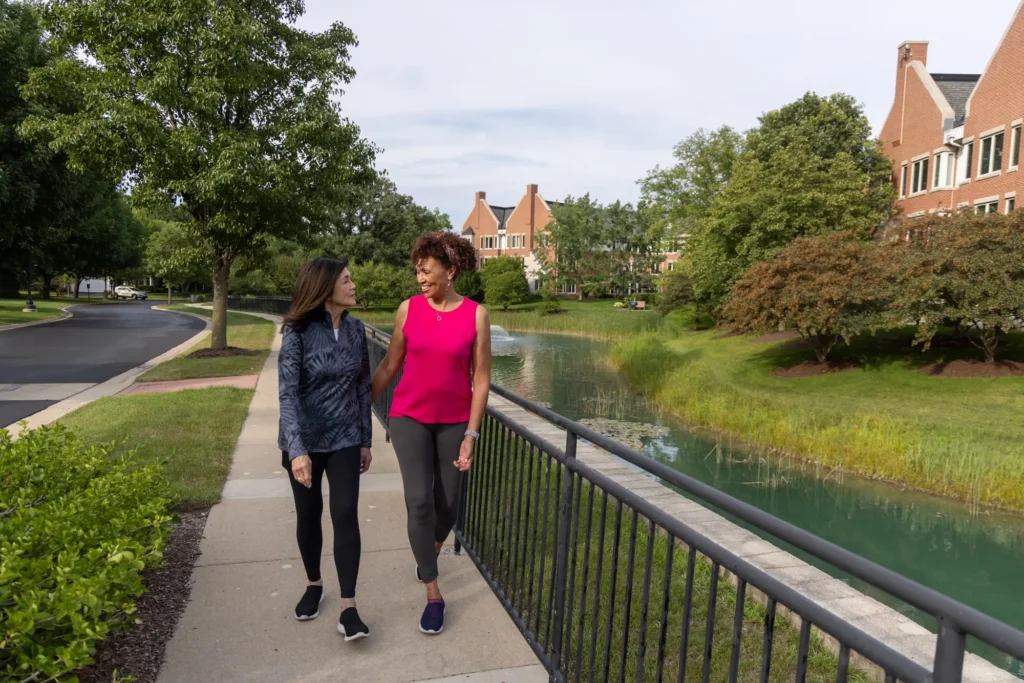 two senior women walking at Lake Forest Place