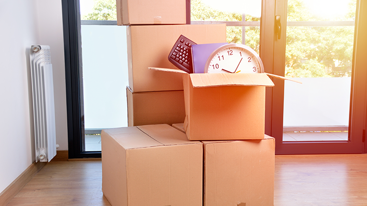 downsizingtips-blog a stack of boxed packed up ready to move