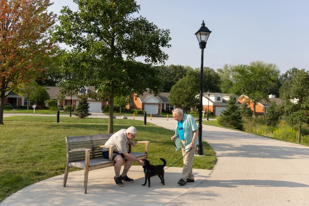 seniors walking dog at The Moorings