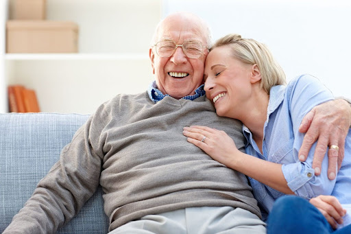 glimpse-into-life-at-the-highlands-1 senior man and woman share funny moment together