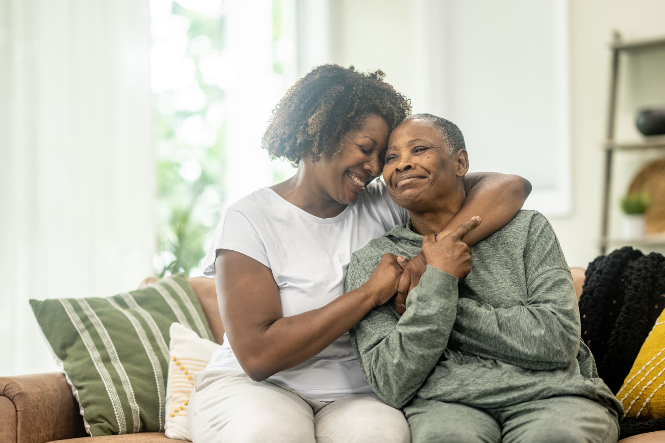 Adult woman and senior mother discussing memory support services in Lake Forest Place, IL