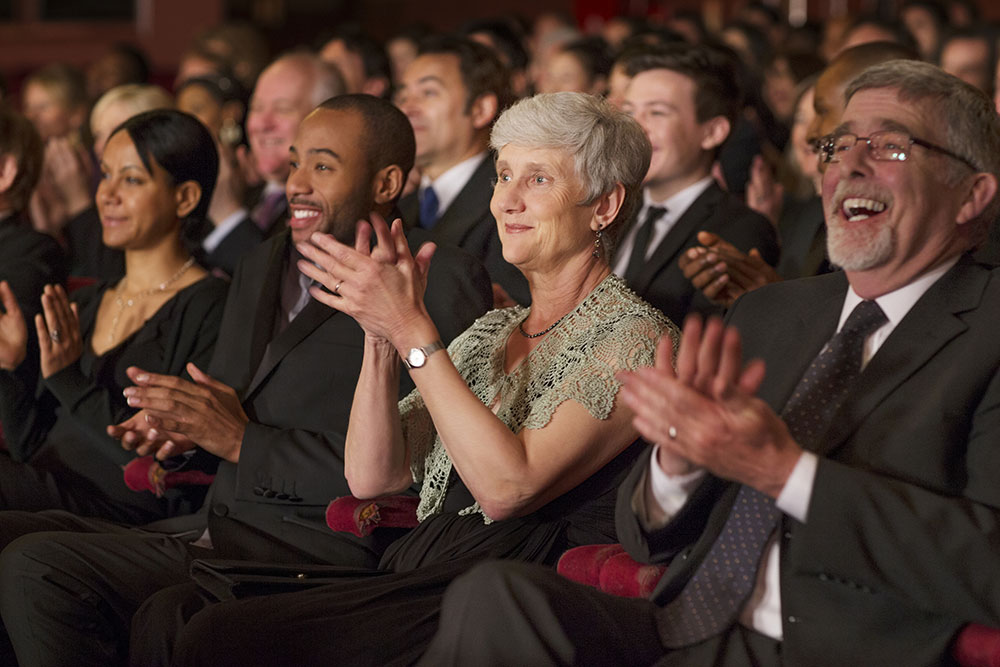iStock-188051552-opt Group of seniors attending a show at the theater