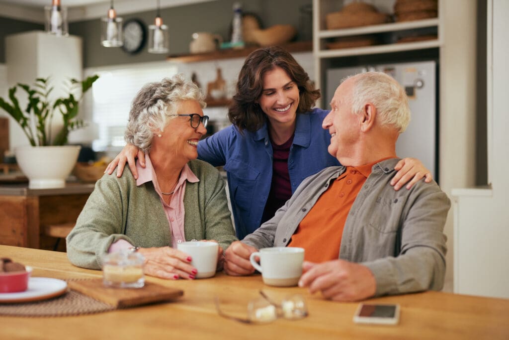 Adult woman discussing memory support services in Lake Forest Place, IL with senior parents