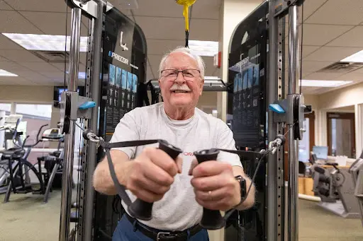 senior man works out in award-winning senior living community, Evanston IL